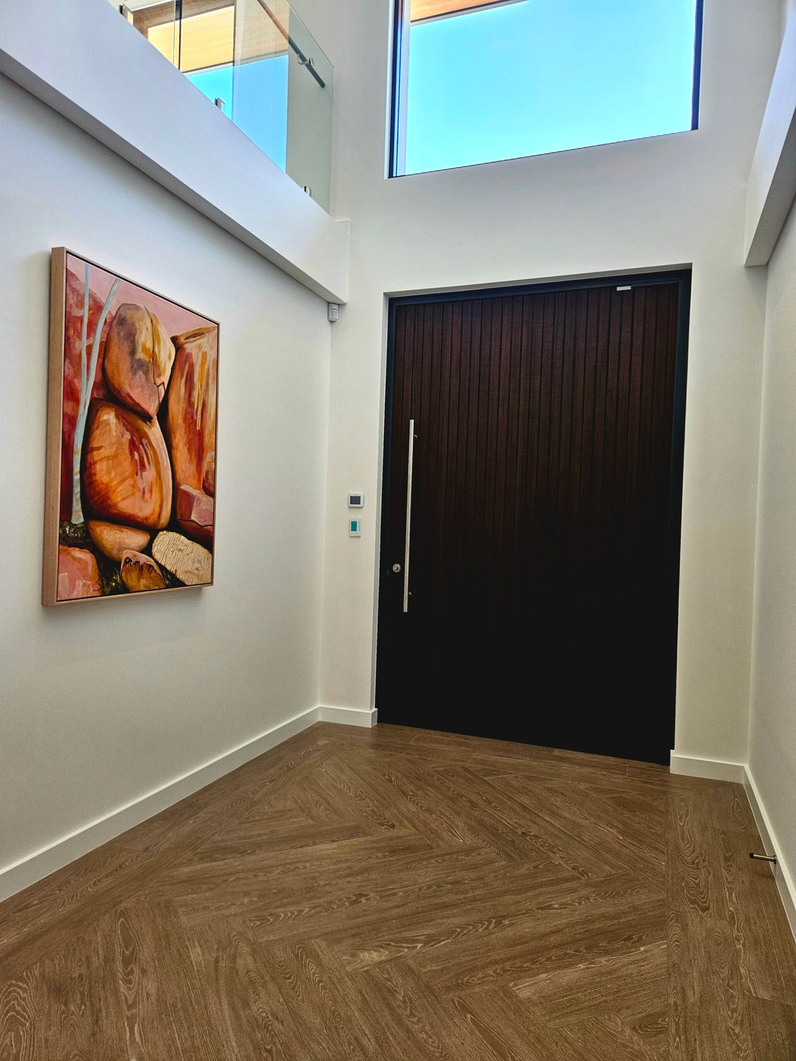 Home painting company working on a two-storey property