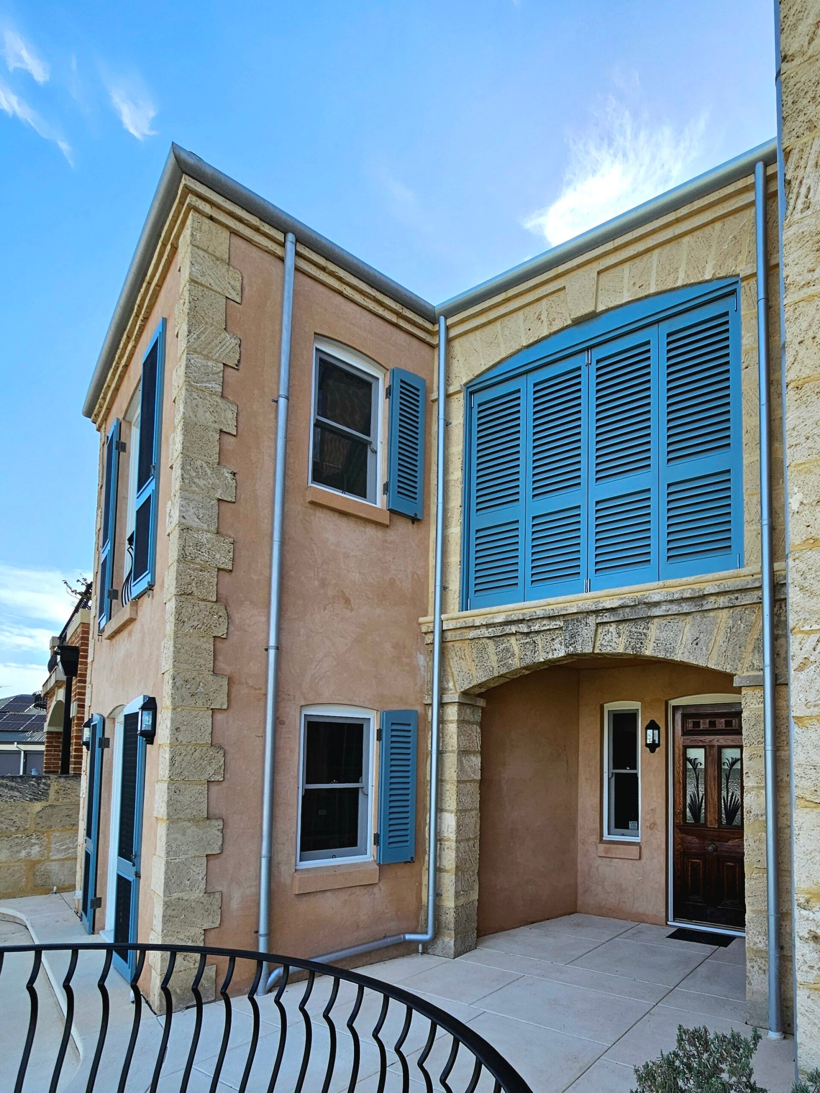 Exterior painting contractors near me coating rendered walls